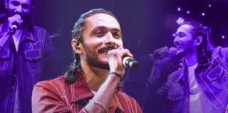 Rushabh Ahir performing live in concert to a large crowd