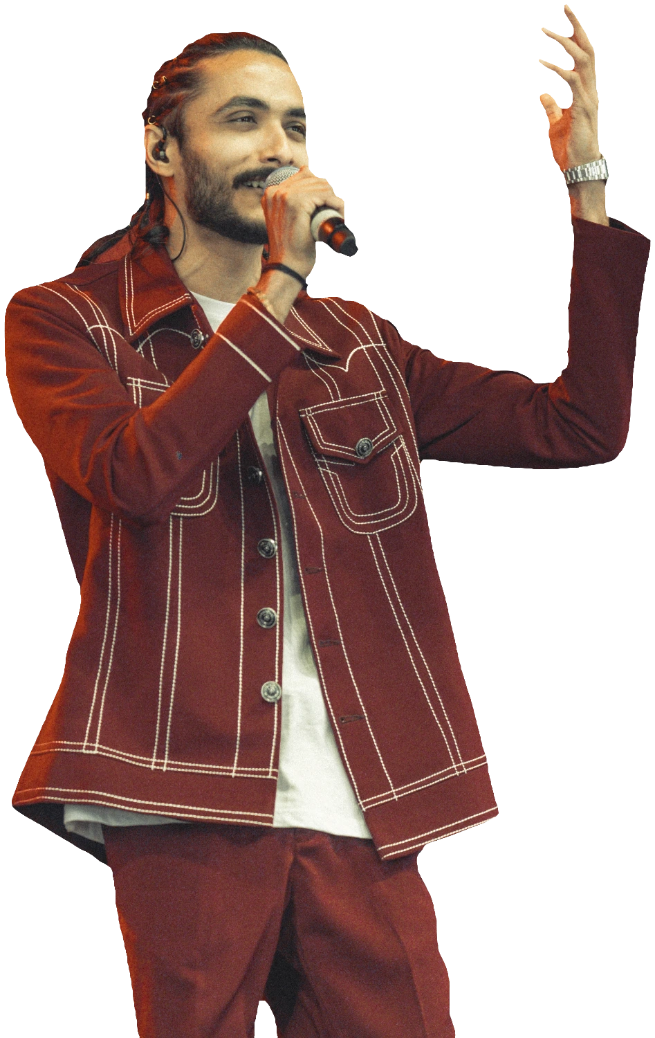 Rushabh Ahir performing live, singing into the microphone
